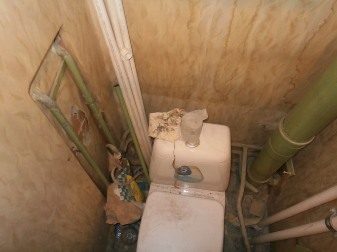 Примеры работ дизайн интерьера отделка ремонт туалета плиткой под ключ фото и цены в Мурманске.